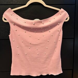 Elegant pink off the shoulder top.